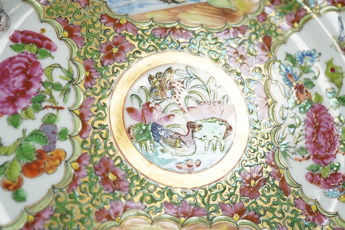 A 19th century Chinese famille rose porcelain dish enamelled with figures and flowers, 25cm in diameter
